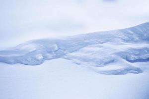 bakgrund. vinterlandskap. snöns struktur foto