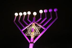 hanukkiah, menora med nio grenar foto