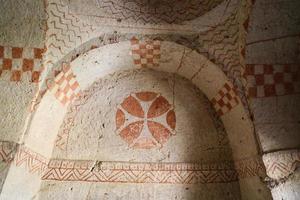 antika målningar i en grottkyrka, Kappadokien, Turkiet foto