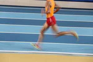 suddiga idrottare springer i friidrott foto