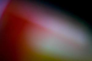 abstrakt färgglad gradient för överlägg. kristallljusläckagebakgrund för bokeh-video och fotoeffekt. prisma lins flare med glöd och magiska ljus på svart bakgrund. foto