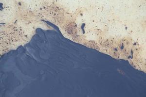 Gulf oljeutsläpp visas på en strand foto