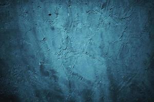 abstrakt grunge blå stuckatur vägg bakgrund. mörk stenvägg koncept bakgrund med plats för text. foto