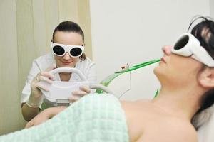 hudvård och laserdepilering foto