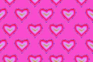 mönster av frihandsskiss form hjärta, färgglada röd rosa blå orange färg designelement isolerade på rosa bakgrund, symbol kärlek alla hjärtans dag foto
