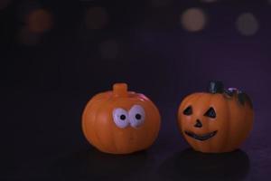 halloween pumpor med bokeh bakgrund foto