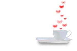 vit kaffe kopp med rök formad hjärta foto