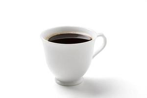 svart kaffe i de vit kaffe kopp foto