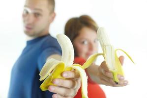 Lycklig par med bananer foto