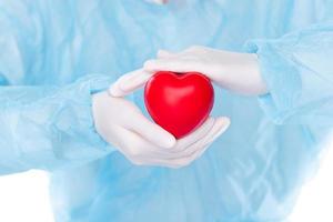 sjukhus medicinsk läkare ta vård hälsa sjukdom och kardiologi. sjuksköterska klinik person examen behandling patient hjärtslag med specialist för liv kärlek med hjärta kirurg enhetlig, kopia Plats foto