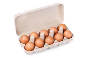 tio brun ägg i en kartong paket foto
