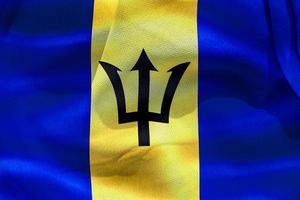 barbados flagga - realistiskt viftande tygflagga foto