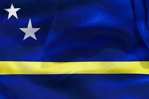 curacao flagga - realistiskt viftande tygflagga foto