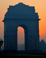 india gate soluppgång foto