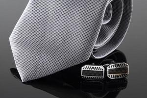 slips med manschettknappar foto