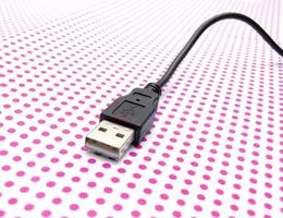 uSB kabel- på prickad bakgrund foto