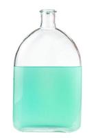 lösning av grön vattenfärg i glas flaska foto
