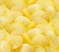 krispiga potatischips snack textur bakgrund foto