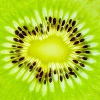 färsk kiwi frukt skivor närbild makro textur bakgrund foto