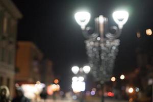 natt stad gata lampor bokeh bakgrund foto