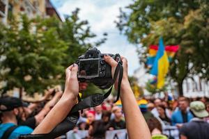 korrespondent tar Foto under de Gay stolthet parad