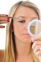 kvinna isolerat öga panna skönhet behandling foto