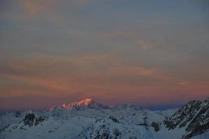 berg snö solnedgång foto