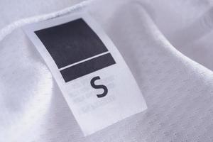 kläder etikett på sport textil fotboll skjorta bakgrund foto