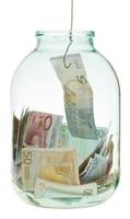 fångst sparande euro pengar från glas burk foto