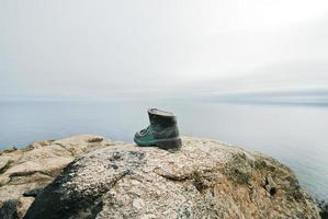 pilgrims känga på cape finisterre foto