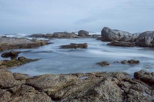 lång exponering marinmålning på de strand foto