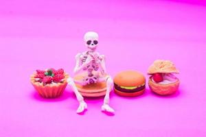skelett och bageri, njut av att äta till döden foto