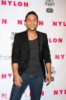 los angeles, 10 april - tahj mowry anländer till nylonmagasinets 13-årsjubileum på smashbox den 10 april 2012 i los angeles, ca. foto