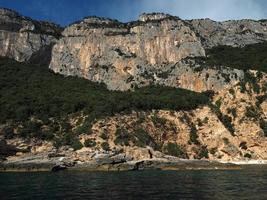 orosei golf cala borta stenar hav klippor sardinien Italien foto