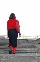 röd strumpor kvinna foto