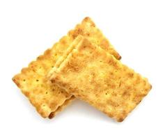 smörgås crackers med grädde isolerat på vit bakgrund foto