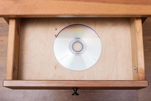 CD disk i öppen låda foto