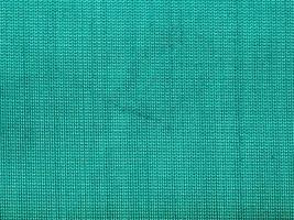 textil- bakgrund - grön silke tyg foto