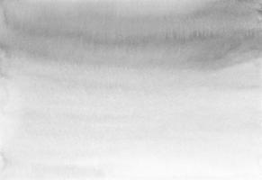 vattenfärg lugna grå ombre bakgrund textur, hand målad. konstnärlig svart och vit bakgrund, fläckar på papper. akvarell svartvit målning tapet. foto