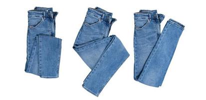 denim set isolerade, vikta blå jeans byxor collage över vita foto
