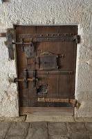 venice - medeltida presession låst dörr foto