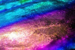 regnbåge holografiska bakgrund. neon och holografiska lutning. foto