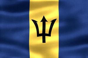 barbados flagga - realistiskt viftande tygflagga foto