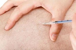 patient gör diabetiker insulin injektioner foto