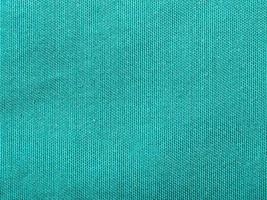 textil- bakgrund - silke grön trasa foto