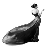 modekvinna i fladdrande klänning. svartvit bild. foto