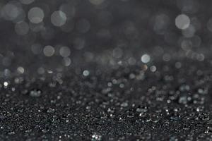 mörk grå vattentät hydrofob platt trasa närbild med regn droppar foto