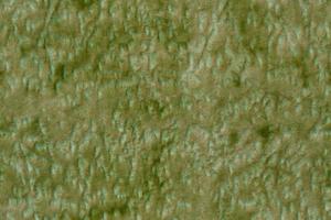 en sömlös textur av syntetisk grön polyester mjuk möbel klädsel foto