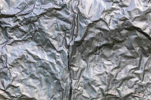 skrynkliga tjock aluminium folie vägg isolering yta textur och bakgrund foto