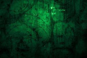 skrämmande mörk grön grunge vägg betong cement textur bakgrund foto